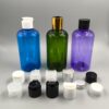 Envases de 250ml en PET Violeta, Verde o Azul modelo BODY con diferentes opciones de tapas